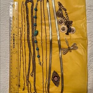 Several pieces, bracelets , pins, necklaces to add to your outfits!